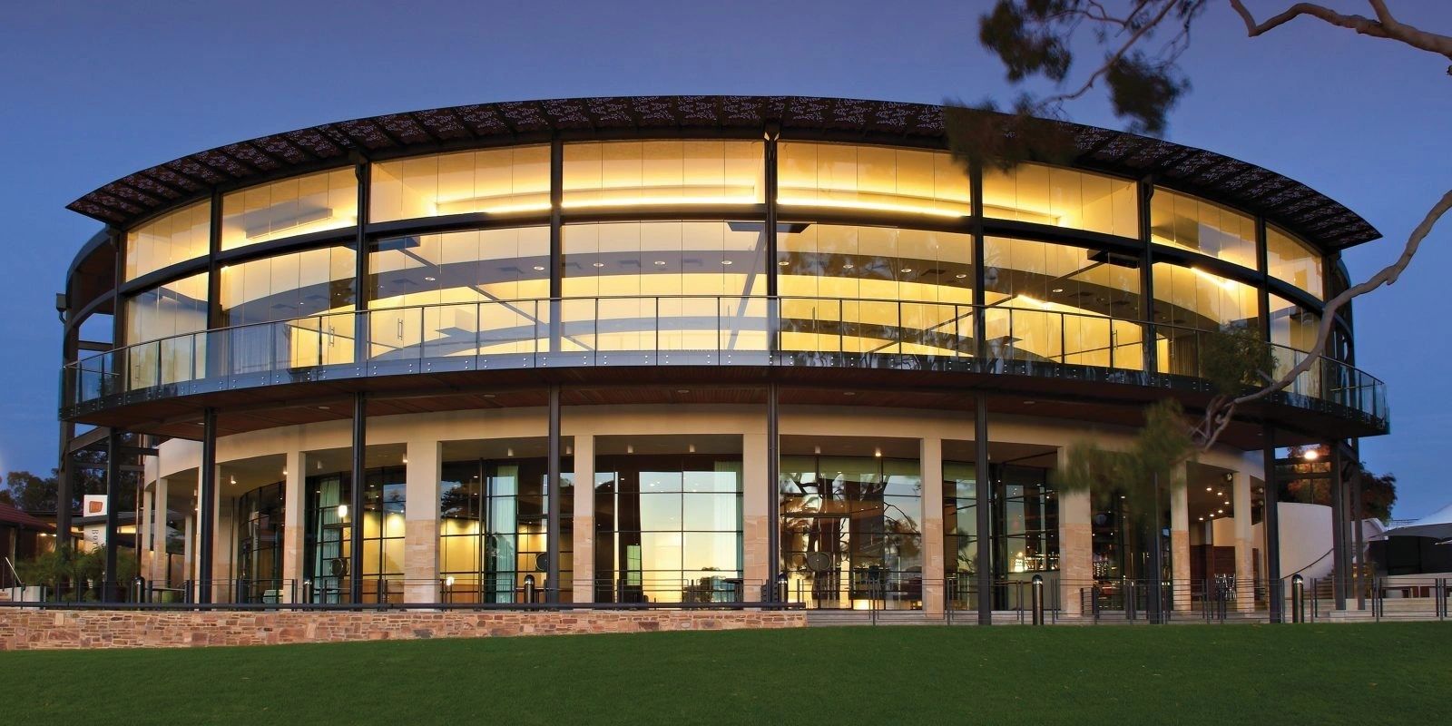 Large commercial building restoration project at dusk